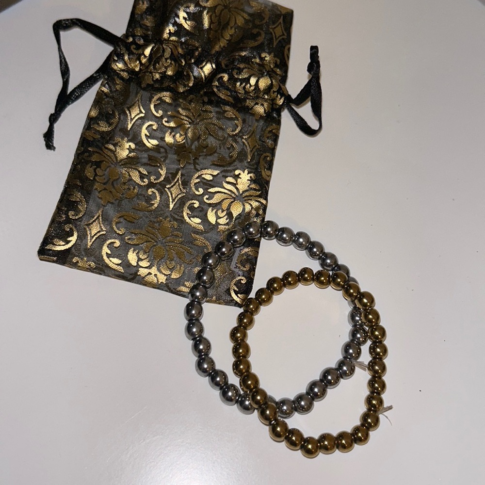 Silver and gold bracelets